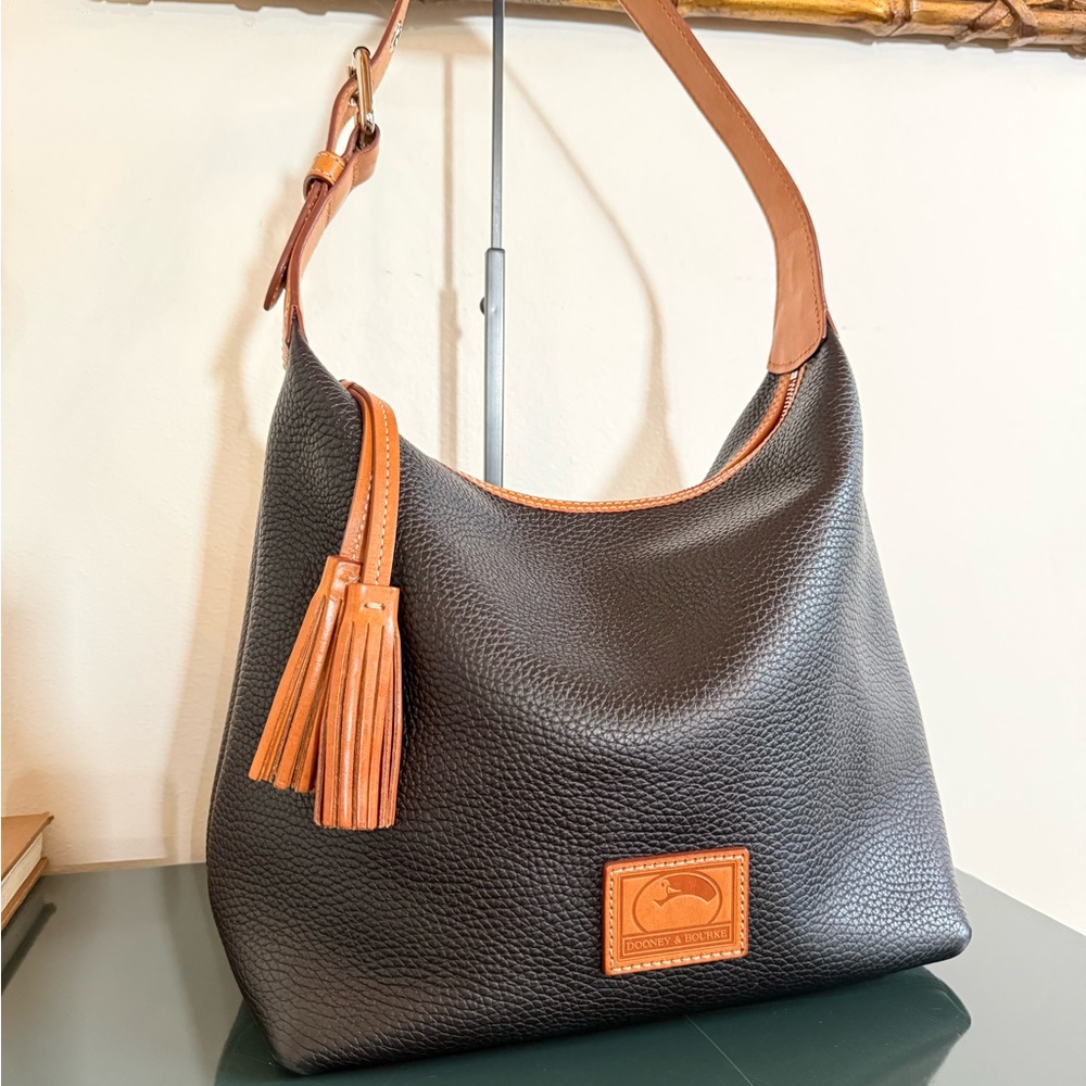 Dooney & Bourke Black Leather Hobo with Tan Trim and Tassel